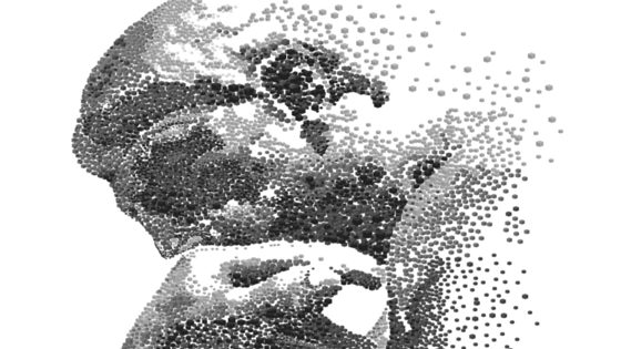 Mindfulness Stoico - Questa immagine mostra una statua di un uomo con la testa tra le mani. L'uomo è fatto di punti neri e bianchi, e sembra essere in uno stato di profonda riflessione.